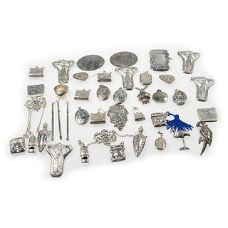Collection of silver jewelry and objects