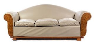 A French Art Deco Burl Amboyna Sofa Height 23 x length 84 inches.