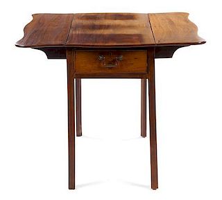 A Chippendale Style Mahogany Drop-Leaf Table Height 28 1/2 x width 17 x depth 34 1/2 inches.