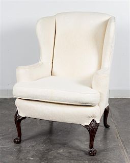 A Georgian Style Wingback Armchair Height 42 1/2 inches.