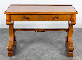 A Regency Style Writing Table Height 29 3/4 x width 43 3/4 x depth 25 inches.