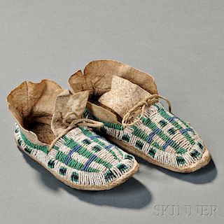 Pair of Cheyenne Beaded Hide Child's Moccasins