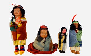 Lot of 4 Native American Skookum dolls, tallest approx 9". One doll is in a permanent sitting position and retains the original manufacturerÃ­s label.