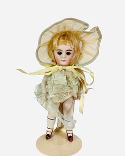 All bisque girl marked "208" likely Kestner. 7" socket head doll with mohair wig, glass sleep eyes, closed mouth, on five-piece body with molded and p