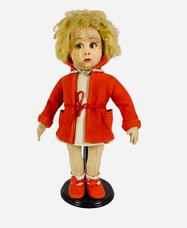 13" formed felt Lenci Series 111 Girl (1927-1931). She has mohair wig, painted side glancing eyes and eyelashes and facial features. Jointed limbs, in