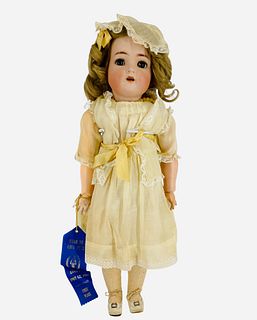 Simon & Halbig K&R bisque socket head "My Darling" in original box. 21" all original doll with mohair wig in original set, glass sleep eyes, molded br