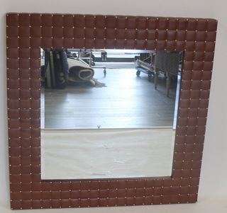 Large Tufted Upholstered Mirror.