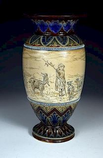 A Doulton Lambeth stoneware vase by Hannah Barlow, the baluster form incised with a young girl, goat