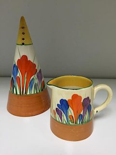 A Clarice Cliff Crocus pattern conical sifter, painted in colours with printed marks, together with