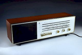 Robin Day, (British, 1915-2010), a model 1108 Pye radio, designed 1965, in teak, aluminium, back-pai
