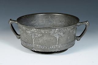 David Veazey for Liberty & Co., a Pewter twin handled rose bowl, cast in low relief with rose trees