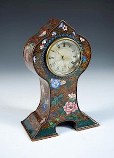 A cloisonné enamel cased mantle clock, decorated with flowers to an aventurine ground, the silvered