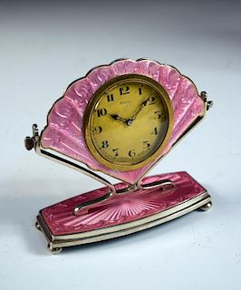 A George V silver and guilloché enamel dressing table clock, Birmingham 1928, the fan-shaped timepie