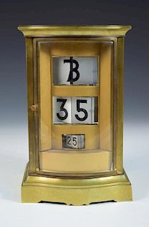A 20th century brass cased four glass ticket clock, the silvered tickets with black Arabic numerals,
