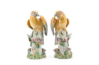 PAIR, STAFFORDSHIRE-STYLE YELLOW PARROT FIGURES