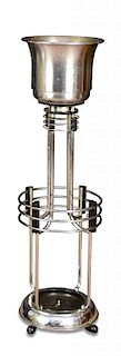 An Art Deco chrome and black plastic champagne or ice bucket and stick stand, the whole raised on fo