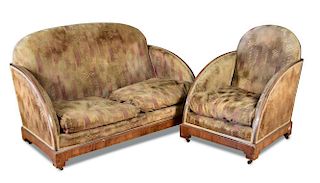 An Art Deco walnut framed three piece suite, comprising two-seater sofa and two armchairs, each with