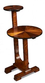 An Art Deco specimen wood two-tier drinks table, the small circular top offset above a larger surfac