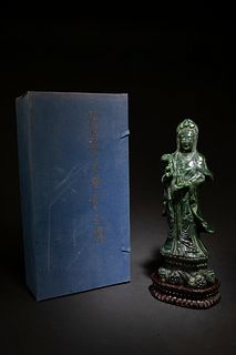 A Carved Spinach Jade Guanyin Statue
