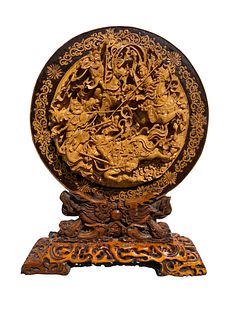 A Round Shaped Carved Wooden Ornament