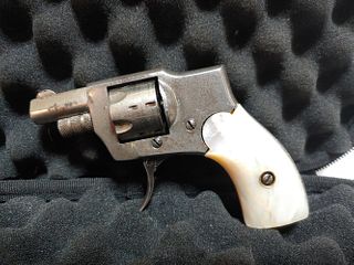 Baby Hammerless model 1918 .22 revolver