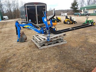 New Holland compact tractor back-hoe