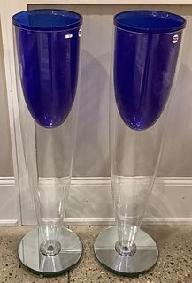Pair of glass floor vases with mirrored bases and cobalt inserts 43" tall. Bottom is open for possible lighting and one is signed as shown.