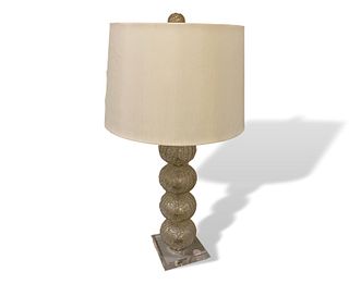 Gold flecked glass lamp with acrylic base, some marks on shade. 28" tall.