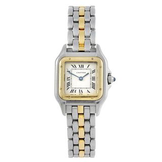 CARTIER - a Panthere bracelet watch. Stainless steel case with yellow metal bezel. Numbered 112000R