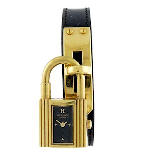 HERMES - a lady's Kelly wrist watch. Gold plated padlock form case. Numbered 949126. Signed quartz m