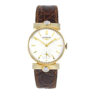 LONGINES - a gentleman's wrist watch. Yellow metal case with white stone set lugs, stamped 14K. Numb