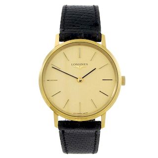LONGINES - a gentleman's wrist watch. Gold plated case with engraved stainless steel case back. Refe