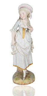 A FRENCH BISQUE PORCELAIN STATUETTE