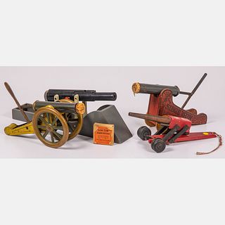Four Metal and Wood Toy Cannons