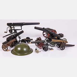 Ten Metal, Brass and Wood Toy Cannons and Anti Aircraft Guns