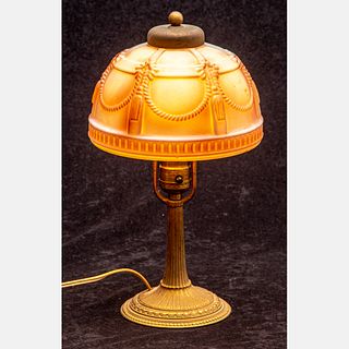 A Pressed Milk Glass and Painted Metal Table Lamp