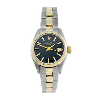 ROLEX - a lady's Oyster Perpetual Date bracelet watch. Circa 1979. Stainless steel case with yellow