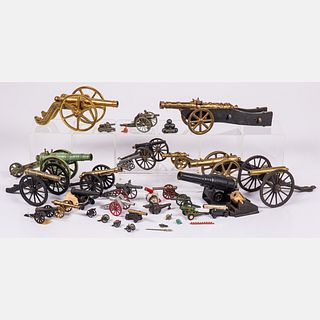 Twenty Seven Metal, Brass and Wood Toy Cannons