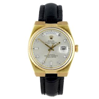 ROLEX - a gentleman's Oysterquartz Day-Date wrist watch. Circa 1979. 18ct yellow gold case with flut