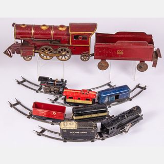 Nine Tin Lithograph Metal and Cast Iron Toy Trains