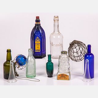 Colored and Clear Pressed and Blown Glass Bottles and Buoys