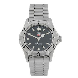TAG HEUER - a mid-size 2000 Series bracelet watch. Stainless steel case with calibrated bezel. Refer