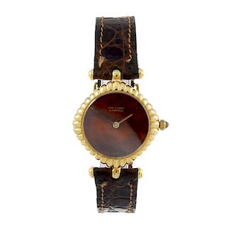 VAN CLEEF & ARPELS - a lady's wrist watch. Yellow metal case, stamped 18k with poincon. Reference 24