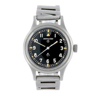 HAMILTON - a gentleman's military issue bracelet watch. Stainless steel case. Stamped with British b