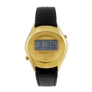 BOUCHERON - a LCD digital wrist watch. Yellow metal case. Numbered 72858. Unsigned quartz movement.