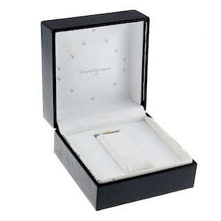 GIRARD-PERREGAUX - a complete watch box. <br><br>Box shows marks, tarnishing and discolouration to t