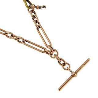 A 9ct rose gold Albert chain and T-bar, all stamped .375. 35cm. 35gms. <br><br>Chain shows light scr