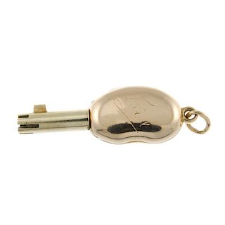 A yellow metal pocket watch key, in the form of a kidney. 21mm. 9gms. <br><br>Kindney shows a engrav