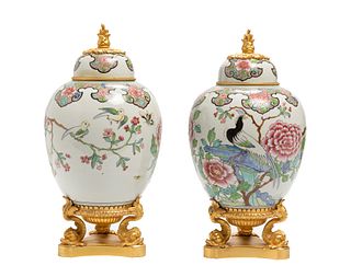 A pair of Chinoiserie lidded porcelain ginger jars
