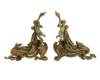 A pair of French Louis XV-style chenets